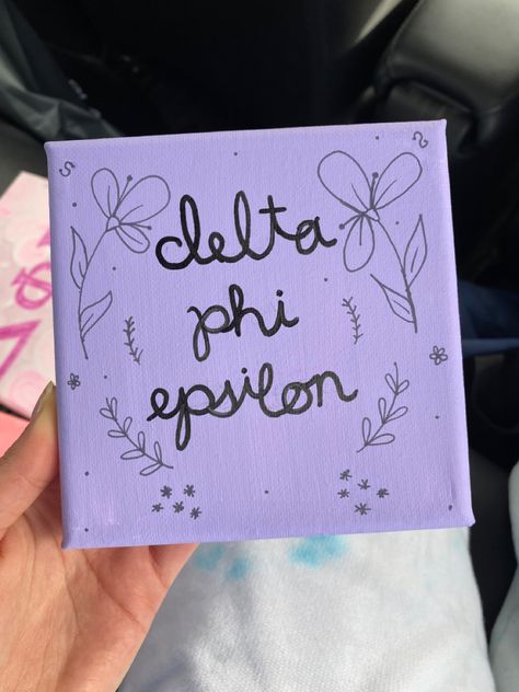 Purple Sorority Canvas, Delta Phi Epsilon Canvas, Sorority Canvas Ideas, Sorority Art, Big Little Basket, Iris Tattoo, Big Lil, Sorority Canvas, Delta Phi Epsilon