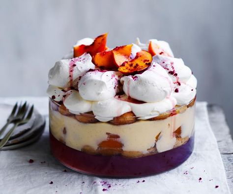 Two favourite desserts combine in this peach and pavlova trifle. Pavlova Trifle, Christmas Trifle Recipes, Summer Trifle, Christmas Trifle, Pavlova Recipe, Trifle Desserts, Trifle Recipe, Xmas Food, Christmas Cooking