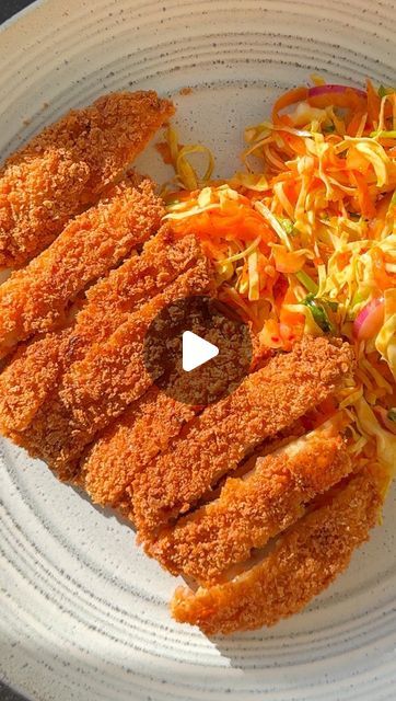 Zena Kamgaing on Instagram: "KIMCHI KATSU! @zenaskitchen Who doesn’t love crispy fried chicken? This recipe puts a Korean spin on a Japanese classic. The chicken gets marinated in kimchi juice, before being breaded and fried to golden perfection. Served with a zingy kimchi slaw, it makes for a belter of a dish. The full recipe is on my website zenaskitchen.com, which is also linked in my bio. I hope you’ll give it a go! #chicken #friedchicken #kimchi #chickenrecipes" Korean Chicken Katsu, Kimchi Chicken, Kimchi Slaw, Crispy Fried Chicken, Fried Chicken Recipes, Marinated Chicken, The Chicken, Kimchi, Fried Chicken