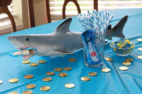 shark party centerpiece Shark Party Centerpiece, Neptune Costume, Party Centerpiece Ideas, Percy Jackson Birthday, Percy Jackson Party, Gift Prank, Shark Week Party, Shark Themed Birthday Party, Teddy Bear Birthday