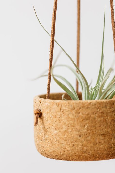 Melanie Abrantes’ Winter Collection introduces new products and a new material- leather- to the designer’s line of home goods focused on showcasing the natural... Diy Planters Indoor, Cork Planters, Pot Gantung, Trendy Interior Design, Diy Pots, Cork Crafts, Vintage Planters, Large Planters, Hanging Planter