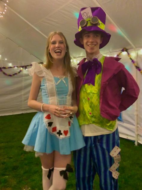 Alice In Wonderland And Mad Hatter Costume, Duo Halloween Costumes Male And Female, Alice And Mad Hatter Costume Couple, Fairy Tale Couples Costumes, Dynamic Duo Costumes Couples Disney, Iconic Duos Couples, Alice In Wonderland Couples Costume, Alice And Cheshire Cat Duo Costume, Couples Halloween Costume Alice In Wonderland