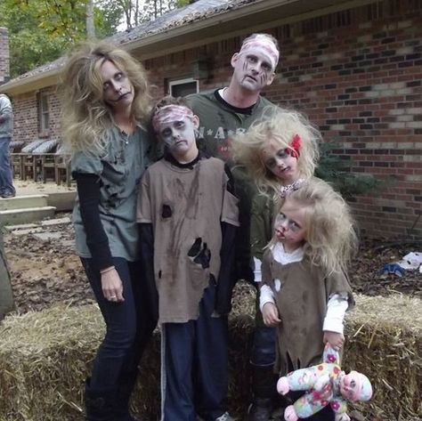 Zombie family costume! This was so fun and so inexpensive. Zombie Costume Family, Zombie Family Halloween Costumes, Costume Zombie, Zombie Family Costumes, Zombie Diy Costume, Zombie Costume Women Diy, Diy Zombie Clothes, Diy Zombie Costume, Zombie Costume Ideas