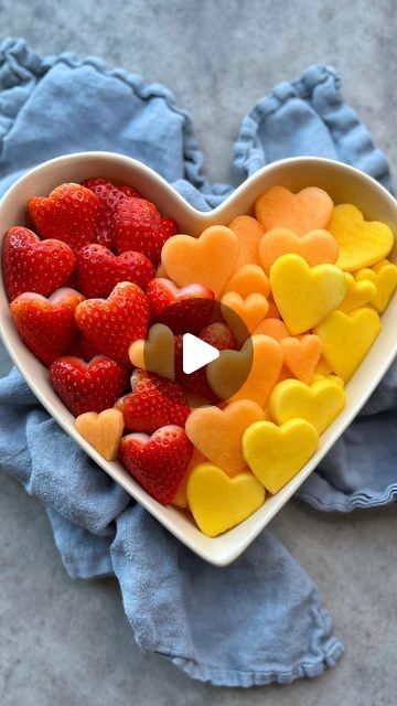 Sine Siemkowicz on Instagram: "Heart of Hearts Platter ❤️🧡💛 With mango, melon and strawberry. Get the instructions on my website (link in bio) or google ‘Foodbites heart of hearts platter’ #valentines #funfood #fruitplatter #strawberries #valentinesdayideas #foodart" Heart Grapes, Food Bites, Heart Shaped Food, Descendants Party, Cut Orange, Instagram Heart, Heart Food, Valentines Day Food, Heart Themed