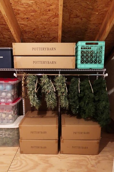 Organized Attic Storage, How To Store Wreaths In Attic, Wreath Storage Ideas, Christmas Decor Storage Ideas, Christmas Ornament Storage Diy, Storage Room Design, Attic Storage Ideas, Attic Storage Solutions, Smart Storage Ideas