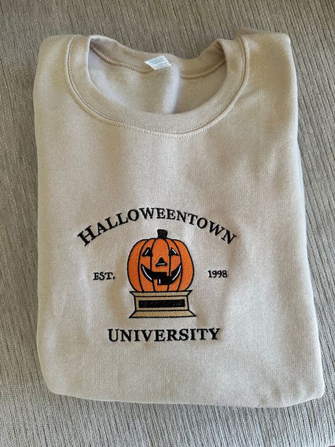 Halloween Town University Sweatshirt, Halloweentown University Sweater, Aesthetic Halloween Sweatshirts, Halloween Cozy Outfits, Halloween Sweatshirt Designs, Halloweentown University Sweatshirt, Halloween Sweaters Aesthetic, Cozy Back To School Outfits, Embroidery Halloween Sweatshirt