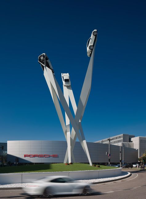 Three sports cars appear to soar up into the sky outside auto brand Porsche's museum in Stuttgart as part of this sculpture by British artist and designer Gerry Judah. Gerry Judah, Car Showroom Design, Porsche Museum, Landscape Sculpture, Museum Display, Car Display, Ferdinand Porsche, Stuttgart Germany, Magic Garden