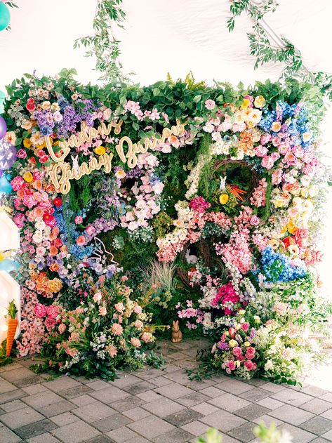 A colorful floral filled dream! | floral inspiration, floral summer, floral decor, flower decorations, floral wall, birthday floral decoration, floral party decorations, floral styling, floral party,planner,decor planner, event planner, event stylist,birthday party, birthday party ideas, party idea,kids party, fun birthday, colorful birthday party,party decorations ideas, decorations party, decor birthday, birthday ideas party, wedding planner #kidsbirthday #birthdayparty #partytheme #floralwall Photowall Ideas Party, Bunny Burrow, Floral Photo Booth, Garden Backdrop, Photowall Ideas, White Wedding Ceremony, Floral Party Decorations, Garden Backdrops, Backdrop Photo