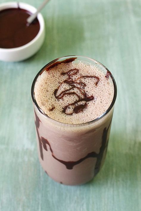 The classic Homemade Chocolate Milkshake Recipe with ice cream. This is thick chocolate shake made with chocolate syrup, milk and ice cream. This is the BEST milkshake and easy to make. Yes it gets ready in 5 minutes only. You can make it healthy by making it without ice cream. Though, it won’t be thick anymore. It will taste more like chocolate milk. #chocolatemilkshake #milkshakerecipe #chocolate #summerbeverage Chocolate Milkshake Recipe No Ice Cream, Milkshake Recipe With Ice Cream, Homemade Chocolate Milkshake, Easy Chocolate Milkshake Recipe, Kids Milkshake, The Best Milkshake, Vanilla Milkshake Recipe, Chocolate Milkshake Recipe, Chocolate Shake Recipe