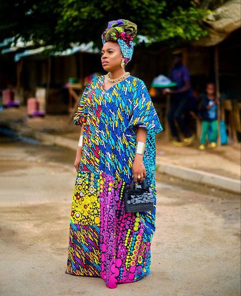 Brightly colored ankara maxi dress made by Debsclothier Ankara Kaftan Styles, Simple Chiffon Dress, Ankara Bubu, Chitenge Dresses, Latest Lace Styles, Ceremony Outfit, White Lace Gown, Ankara Maxi Dress, Kaftan Styles