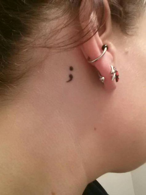 Semi colon Semi-colon Tattoo On Neck, Semi-colon Tattoo Ideas Finger, Stick And Poke Tattoo Semi Colon, Behind The Ear Semi Colon, Semicon Tattoo, Semi Colons Tattoos, Semi Colon Behind Ear Tattoo, Tattoo Ideas Female Semi Colon, Semi-colon Tattoo Behind The Ear