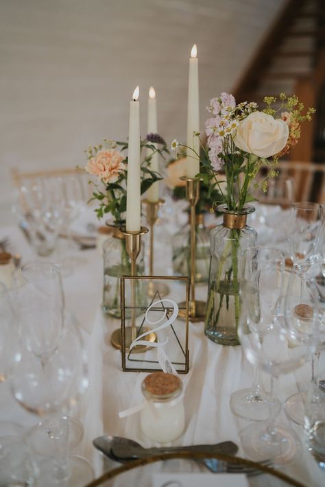 Neutral Wedding Round Table Decor, Candle Sticks And Bud Vases, Glass Candle Sticks Wedding, Bud Vases Wedding Centerpiece Round Table Setting, Wedding Centerpieces Candlesticks, Flowers In Bud Vases, Wedding Dress Pastel, London Wedding Dress, Round Table Centerpieces