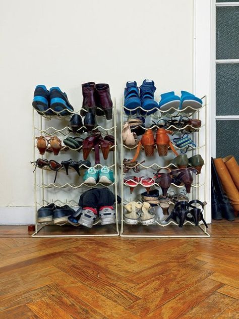 In the foyer: This Belgian home, featured on Dwell, uses a wine rack as shoe storage for the whole family. Other Uses For Wine Rack, Wine Rack Uses, Wine Rack Storage, Wooden Wine Rack, Shoe Shelves, Shoes Storage, Lamb Decorations, Diy Wine Rack, Shoe Racks