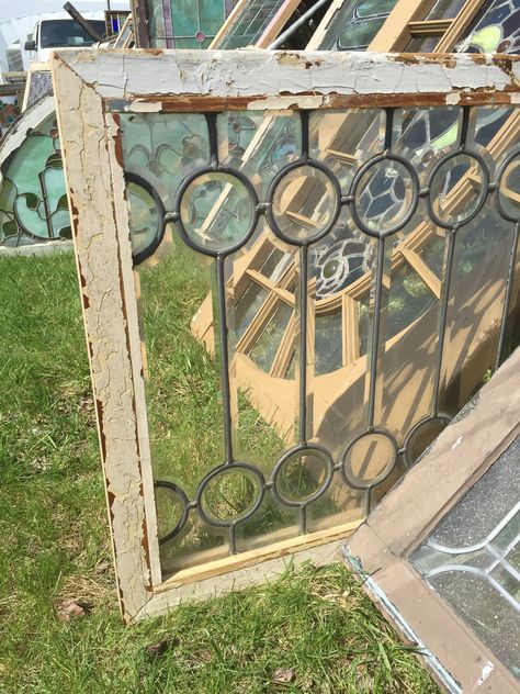 This chick LOVES leaded glass circles  | leaded glass window | glass rondels bullseyes | in The Meadows Rondel Glass Window, Leaded Glass Windows Repurposed, Junking Ideas, Glass Rondels, Staircase Window, Garage Windows, Reuse Recycle Repurpose, Repurposed Windows, Glass Circle