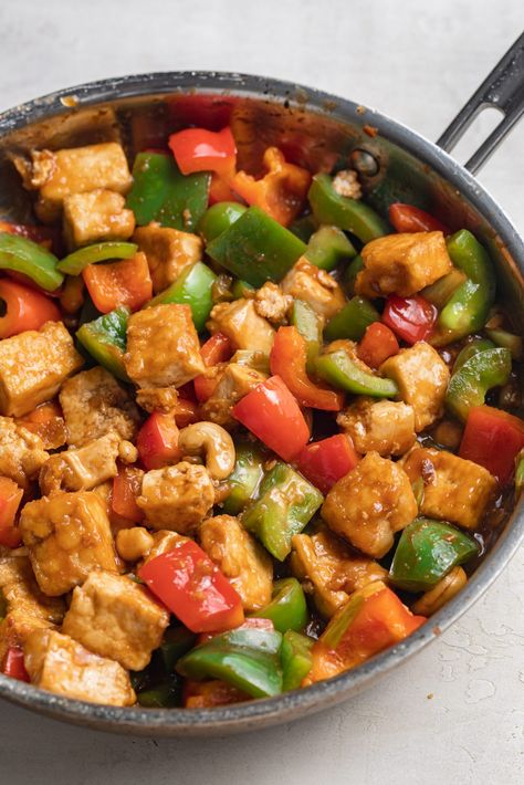 This kung pao tofu will quickly become one of your favorite dinner recipes! One pan and 15 minutes is all you need for this intensely flavorful meal. This kung pao tofu is also entirely vegan, plant-based, and gluten-free! One Pot Tofu Recipes, King Pao Tofu, Meals With Tofu, Dinner Recipes One Pan, Wfpb Recipes No Oil, Vegan Tofu Recipes, Tofu Dinner, Favorite Dinner Recipes, Kung Pao Tofu