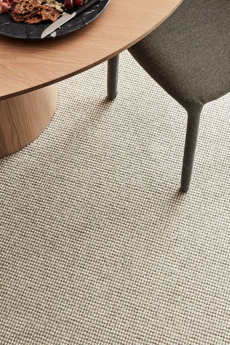 Bring the luxury of wool carpet to your family home. Woven with a multilevel loop pile, Bainbridge boasts the benefits of wool and features a subtle lineal pattern that adds depth to its design. Available in a versatile range of neutral shades to suit any interior, it’ll bring a pleasing feel to living areas and bedrooms alike. Styling - Bree Leech. Photography - Mike Baker Wool Carpet Living Room, Japandi Carpet, Carpet Flooring Bedroom, Wool Loop Carpet, Lounge Carpet, Carpet Photography, Grey Carpet Living Room, Loop Pile Carpet, Round Room