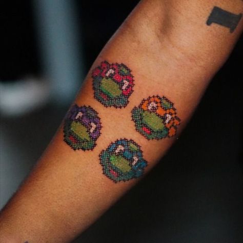 teenage mutant ninja turtles faces cross-stitch tattoo, Leonardo, Michelangelo, Donatello, Raphael Teenage Mutant Ninja Turtle Tattoo, Michelangelo Ninja Turtle Tattoo, Ninja Turtle Tattoos Ideas, Ninja Turtles Tattoos, Donatello Tattoo, Tmnt Tattoo Ideas, Teenage Mutant Ninja Turtles Tattoo, Ninja Turtles Tattoo, Tmnt Tattoo