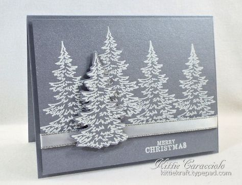 I created a clean and simple holiday card with the white embossed trees on brushed silver cardstock. This would be a great card to mass produce for the holidays. Sadly the photo just doesn't show how pretty and elegant this card is. The brushed silver paper is so pretty. You can see more details on my blog post at [url=http://www.kittiekraft.com/2016/09/brushed-silver-snowy-trees.html]Kittie Kraft[/url]. Simple Holiday Cards, White Trees, Tree Stamp, Snowy Trees, Homemade Christmas Cards, Christmas Tree Cards, Tree Cards, Diy Christmas Cards, Merry Christmas Card