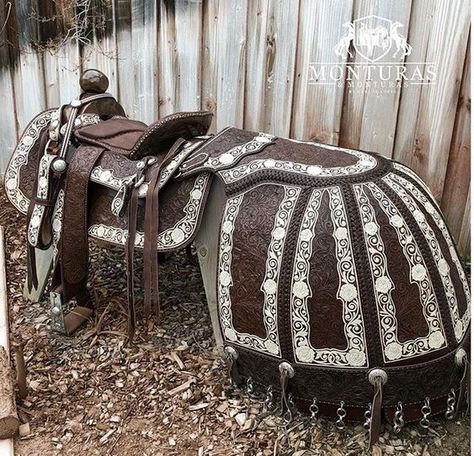 Spanish-style saddle, tooled and embroidered leather, with anquera, or rear skirting. Medieval Horse, Horse Facts, Expo Center, Horse Costumes, Horse Armor, Horse Equipment, Horse Bridle, Horse Gear, Horse Accessories