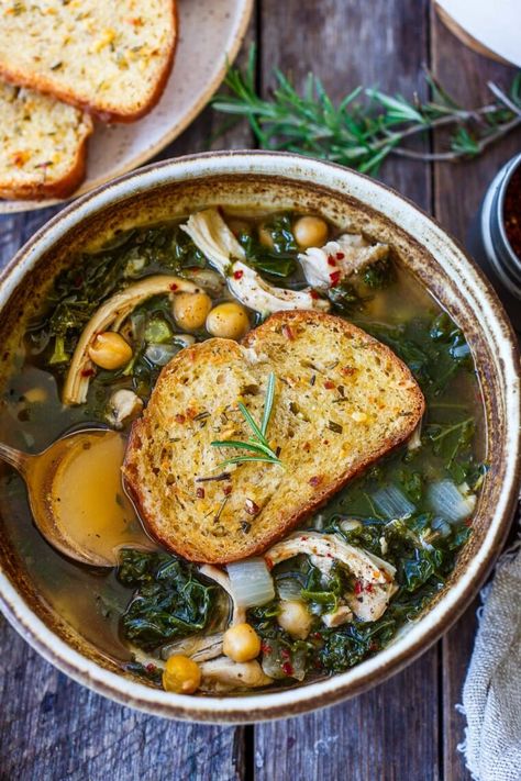 This savory chicken and Kale Soup with chickpeas, topped with a crispy rosemary garlic crouton is comforting and delicious! Andouille Soup, Chicken And Kale Soup, Chicken Kale Soup, Soup With Chickpeas, Asian Chicken Meatballs, Chicken And Kale, Kale Chicken, Chicken Potato Soup, Kale Soup Recipes