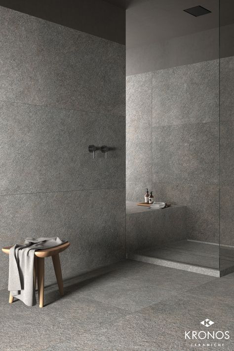 Rock Tiles Bathroom, Bathroom Plinth, Gray Stone Bathroom Floor, Bathroom Tiles Natural Stone, Grey Stone Bathroom, Porphyry Stone, Bathroom Grey Stone, Bathroom Tiles Stone Effect, Dark Grey Terrazzo Bathroom