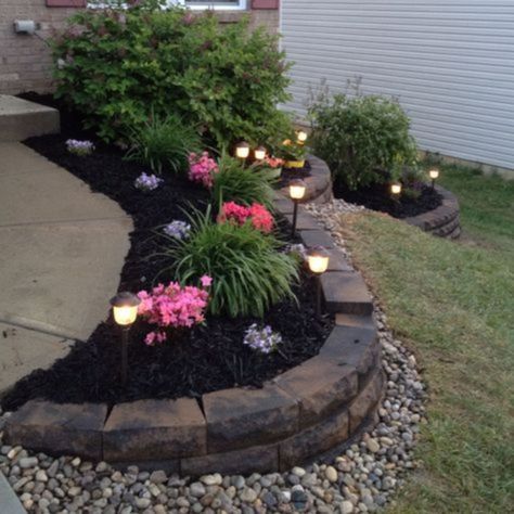 fine 49 Outdoor Garden Decor Landscaping Flower Beds Ideas https://matchness.com/2017/12/31/49-outdoor-garden-decor-landscaping-flower-beds-ideas/ Flower Bed On Sloped Yard, Corner Curb Appeal Yard Landscaping, Dark Mulch Landscaping Flower Beds, Front Yard Land Scaping Ideas, Dark Mulch Landscaping, Flower Bed Lighting, Retaining Wall Garden, Taman Air, Mulch Landscaping