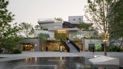 Stacked boxes create a zigzagging indoor-outdoor plaza in Nanhu District, Jiaxing Modular Cabins, Wood Facade, China Architecture, Facade Material, Ground Cover Plants, Timber House, Architecture Studio, High Walls, Urban Environment