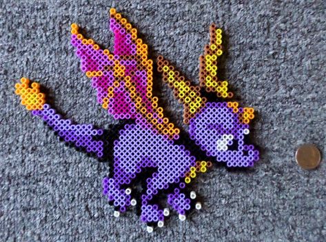 Long Black Fingers : Spyro The Dragon Cupcake Factory, Pokemon Perler Beads, Vanellope Von Schweetz, Melty Bead Patterns, Pearl Beads Pattern, Art Perle, Spyro The Dragon, Perler Art, Perler Bead Templates