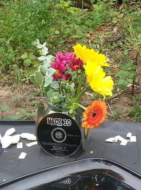 Attached old CD's to small vases that I had around the house for a 90's hip hop themed bbq in the park. Cd Centerpiece Ideas, 2000 Trends, Music Centerpieces, Decades Party, Themed Centerpieces, 90's Hip Hop, 90s Decor, Gender Reveal Party Theme, Small Vases