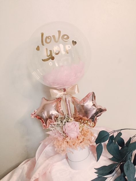 Inclusions: ✔ Customized dried flower arrangement inside a box ✔ Printed text ✔ 10 inch clear balloon with feathers inside Unique gift ideas for girlfriend/boyfriend Unique gift ideas for loved ones #BloomBalloons #HotAirBalloonBouquet #Brilliant DecorsPH #CebuBased #DriedFlowers #DriedFlowersArrangement Hot Air Balloon Bouquet, Mini Hot Air Balloon, Clear Balloon, Balloon Arrangement, Clear Balloons, Balloon Arrangements, Custom Balloons, Balloon Bouquet, Girlfriend Boyfriend