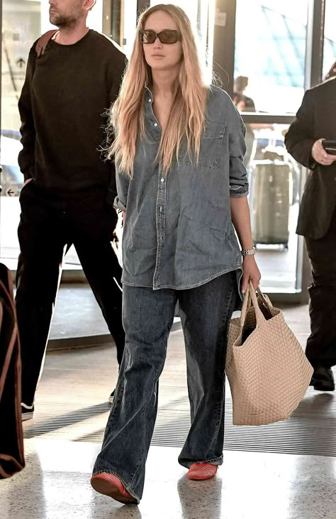 Jennifer Lawrence's Denim-on-Denim Airport 'Fit is a Comfy Classic You Can Recreate with These Shirts Starting at $25 Jennifer Lawrence Street Style, Jennifer Lawrence Style, Denim Shirt Outfit, Purse Style, Jfk Airport, Airport Fits, Quilted Bags, Woven Bags, Grooming Tips