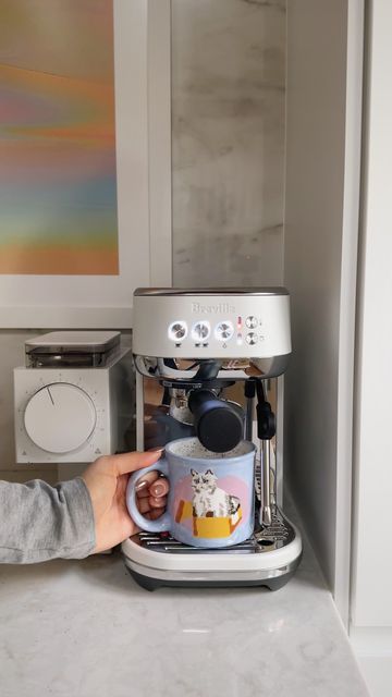 Jamie Paige on Instagram: "the newest addition in the kitchen ☕️😮‍💨 I told you guys that I would let you know which espresso machine I went with - and after lots of research, I ended up buying the @brevillecanada Bambino plus (in sea salt, which is a brushed white, to match my @fellowproducts grinder + kettle). #espressomachine #coffeegram #coffeelover #coffeecorner" White Coffee Machine, Breville Bambino Plus, Breville Bambino, Coffee Bar Home, Coffee Corner, Home Design Decor, White Coffee, Design Decor, Told You