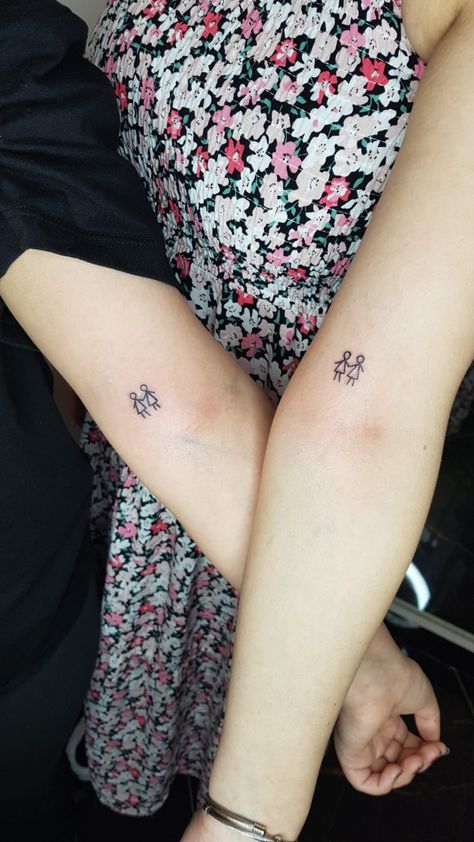 sisters tattoo Stick Figure Sister Tattoo, Meaningful Twin Tattoos, Matching Tattoos For Family Of 4, Minimal Sister Tattoo, Tattoo 3 Sisters, Simple Sister Tattoos For 2, Twins Tattoo Ideas, Sister Tattoos Unique, Cousin Tattoos Meaningful