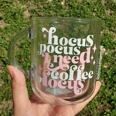 Hocus pocus I need coffee to focus glass mug #hocuspocus #hocuspocus2 #coffee #glassmug #coffeaddict #coffeemug #teamug #coffeeaddiction #vinylglassmug #vinylcrafts #customglassmug #vinyl #cricutvinyl #cricutexploreair2 #cricutglassmugs Circuit Mug Ideas, Hocus Pocus I Need Coffee To Focus, Cricut Mug Ideas, Vinyl Mugs, Business Crafts, Mug Ideas, Hocus Pocus 2, I Need Coffee, Halloween Vinyl