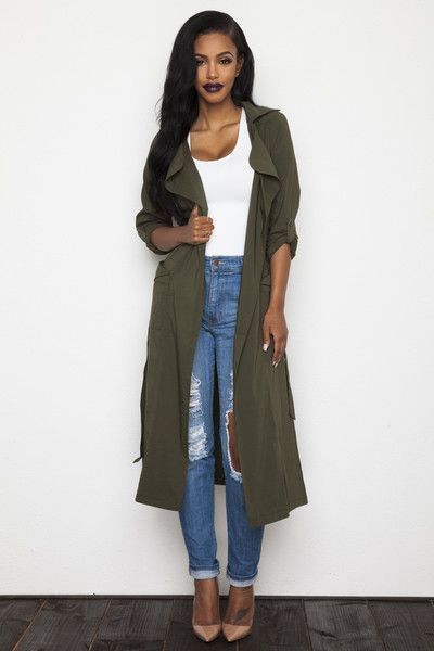 Marry an olive lightweight trenchcoat with blue distressed boyfriend jeans to get a laid-back yet stylish look. Go for a pair of tan leather pumps to va-va-voom your outfit.   Shop this look on Lookastic: https://lookastic.com/women/looks/olive-trenchcoat-white-tank-blue-boyfriend-jeans/18899   — White Tank  — Blue Ripped Boyfriend Jeans  — Tan Leather Pumps  — Olive Lightweight Trenchcoat Green Trench Coat Outfit, Coat Ootd, Comfy Jeans Outfit, Ripped Jeggings, Green Trench Coat, Trench Coat Outfit, Neutral Shoes, Ripped Boyfriend Jeans, Coat Outfit