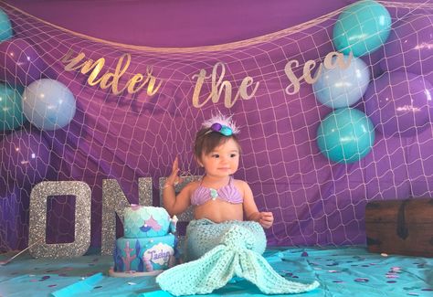 My daughter on her first birthday. Mermaid themed cake smash Mermaid Birthday Smash Cake, Mermaid First Birthday Party Decoration, Mermaid Smash Cake One Year Old, Little Mermaid First Birthday Party, Little Mermaid 1st Birthday Party, Mermaid 1st Birthday Party, Mermaid Birthday Party Decorations, Mermaid Theme Birthday Party, Ariel Birthday