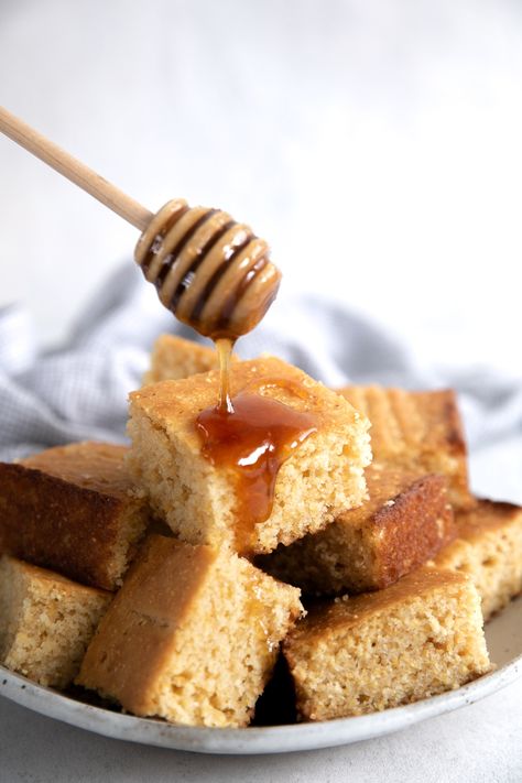 Enjoy fresh baked Cornbread - ready in just 30 minutes- with this delicious, moist, and buttery Cornbread Recipe. Crispy golden edges and perfect fluffy center, this recipe is made with simple ingredients and no mixer required! Best Sweet Cornbread, Homemade Sweet Cornbread, Buttery Cornbread Recipe, Baked Cornbread, Sweet Cornbread Recipe, Buttery Cornbread, Easy Cornbread, Easy Cornbread Recipe, Leftover Cornbread