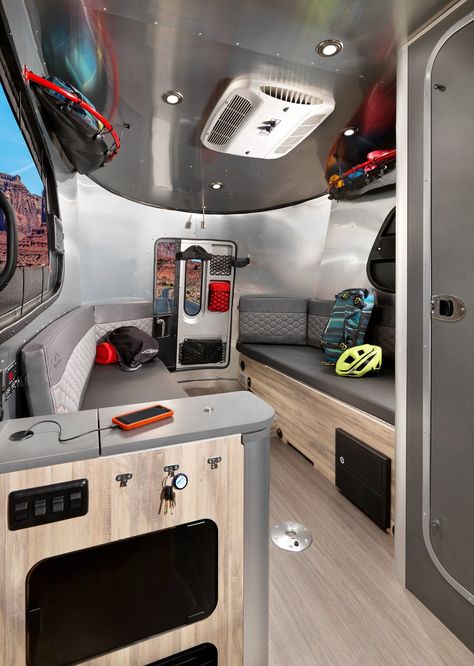 Dwell - Airstream's Basecamp Is a Lightweight Trailer Stuffed With Smart Travel Solutions Airstream Basecamp 20x Decor, Airstream Bambi Storage Ideas, Argosy Airstream Remodel, Airstream Bambi Organization, Airstream Globetrotter Interior, Basecamp Airstream, Airstream Basecamp, Airstream Basecamp Rei, Lightweight Trailers