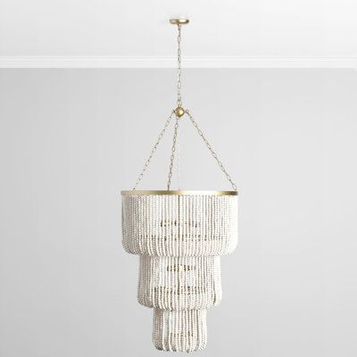 With artisanal wooden beads and a traditional three-tiered silhouette with a crisp, modern palette, this chandelier transcends any single style to create a breathtaking look that suits any design. | Bungalow Rose Fritsche 11 - Light Unique Tiered Chandelier in White / Yellow | 37.5 H x 28 W x 28 D in | Wayfair White Beaded Chandelier, White Bead Chandelier, Chandelier White, Modern Palette, Tiered Chandelier, White Chandelier, Classic Home, Beaded Chandelier, Candelabra Bulbs