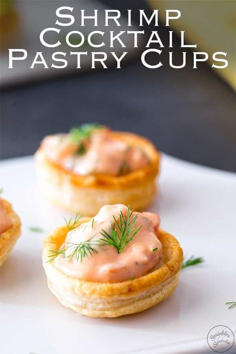 These Creamy Shrimp Cocktail Pastry Cups take two retro dishes and transform them into one delicious party food bite. The shrimps are stirred through a creamy cocktail sauce (marie rose sauce), enhanced with fresh dill then piled into a delicate puff pastry cup. These are the perfect easy appetizer for a party or evening entertaining | Recipe by Sprinkles and Sprouts | Delicious food for Easy Entertaining #shrimpcocktail #prawncocktail #volauvents #partyfood #fingerfood #appetizer #easyapetizer Prawns Appetizers, Marie Rose Sauce, Pastry Cups, Sprouts Recipes, Creamy Cocktails, Wonton Cups, Retro Dishes, Creamy Shrimp, Prawn Cocktail