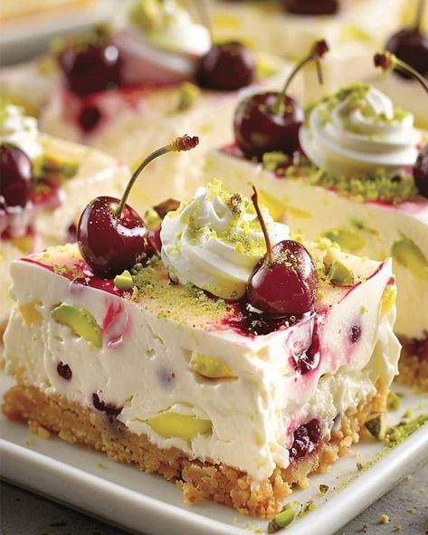 Lemon-Lime Cherry Pistachio Cheesecake Bars Cheesecake Base, Cherry Pistachio, Strawberry Sugar Cookies, Pistachio Cheesecake, Cherry Sauce, Peach Ice Cream, Lime Cheesecake, Frozen Cherries, Creamy Cheesecake