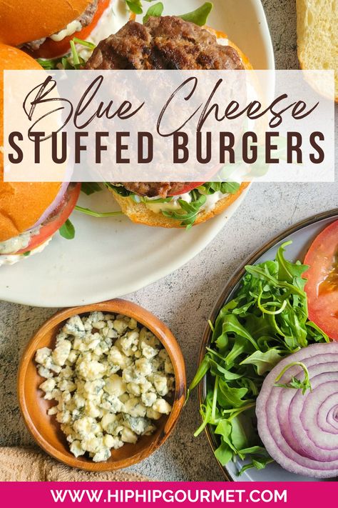 a plate of burgers next to a plate of burger toppings and a bowl of blue cheese Blue Cheese Hamburgers, Stuffed Blue Cheese Burgers, Blue Cheese Stuffed Burgers, Buffalo Blue Cheese Burgers, Blue Cheese Burger Recipes, Blue Cheese Burgers Recipes, Stuffed Hamburgers, Hamburger Dinners, Bleu Cheese Burger