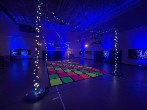 Glow Party Dance Floor, Decades School Dance Theme, Middle School Glow Dance, Middle School Dance Decor, Neon Glow School Dance, Decorating A Gym For A Party, Glow School Dance, Neon School Dance, Spring Dance Themes