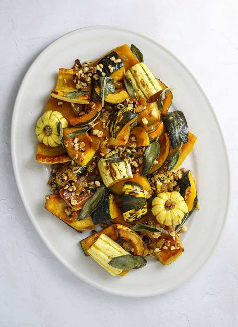 Sweet and savory winter squash roasted with maple syrup and drizzled with nutty brown butter, crispy sage, toasted hazelnuts, and golden raisins. Trust me, this easy recipe is about to become your go-to fall side dish! Craving California, Squash Roasted, Savory Bread Puddings, Crudite Platter, Ginger Molasses, Brown Butter Sauce, Autumn Side Dishes, Ginger Molasses Cookies, Cranberry Sauce Homemade