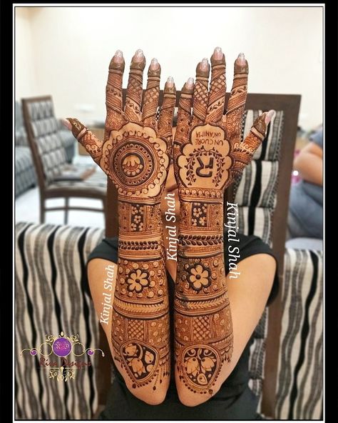 Unconventional Bridal Henna!! U get to try different things wen ur bride do not wanna go with the norm. This cute bride of mine wanted an authentic bridal but also din't wish to have typical Dulha n dulhan. Hence while surfing the net she came across some really gud designs n wished that I shall incorporate them. At the back of her hand, she wanted this logo to be replicated the way it was... instead of a normal fiance name style(again being unconventional 😊and I like it). For Mehndi order book Bridal Mehendi Back Hand With Name, Mehndi With Name Design, Back Hand Mehndi Designs With Name, Bridal Mehendi With Name, Bridal Mehndi Designs With Names, Mehndi Designs Name, Mehndi Designs With Name, Baby Shower Mehndi Designs Hand, Name Mehndi Design