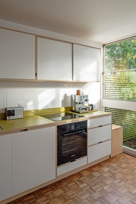 Span House Interior, Internal Glazing, Uncommon Projects, Modernist Kitchen, Ply Kitchen, Glass Room Divider, Plywood Kitchen, Maple Plywood, Mid Century Kitchen