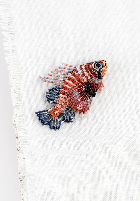 Materials: Glass beads, thread, felt, stainless steel backing Size: 2.5" x 2” Origin: India See More: Shop the entire collection Embroidered Fish, Beaded Fish, Fish Embroidery, Fish Beads, Embroidered Necklace, Beaded Applique, Sea Fish, Bead Stitching, Hat Pins