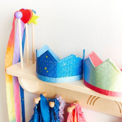 Our NEW Wooden Dress-up Display! The perfect addition to your playroom and invites hours of open-ended play!🌈 ⭐ 6 pegs to hold your dress-ups ⭐ 1 slot to fit your soft silk sword ⭐ 3 holes to display your streamers #sarahssilks #dressup #playsilks #playroom #openendedplay Wooden Dress, Encaustic Wax Art, Wax Art, Christmas World, Track Toy, Traditional Toys, Play Furniture, Open Ended Play, Soft Toy Animals