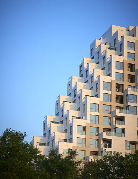 Habitat Qinghuangdao, designed by Safdie Architects, is in Jin Meng Hai Wan, Qinhuangdao, China. - photo from Kerry Properties and Safdie Architects, via archdaily;  a beachfront residential community; stacked modules are staggered Staggered Building, Stacking Building Architecture, High Rise Building Facade Architecture, Highrise Buildings Architecture, Singapore Buildings Architecture, Residential Tower Facade, Apartments In Dubai, Architectural Section, Building Section