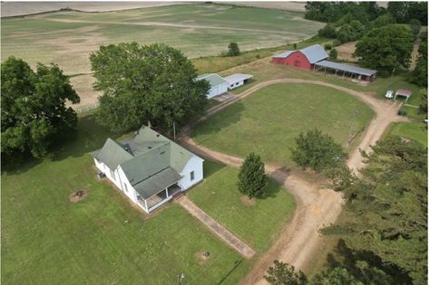 Cozy and charming 1925 farmhouse for sale that along with the garage, barn, outbuildings and pond, all on 10.6 level acres, could be anything you want to make it. I love the layout of this farm complex, it's perfect. REALTOR COMMENTS This is a very unique property and your chance to own a piece of Water Valley history that can be residential/commercial, extra large horse/cattle barn. Country living on S. Main St., #backtotheland #countryhome #countryhomeforsale #countrylife Farm Layout 10 Acres, Horse Farm Layout, Cattle Barn, Horse Barn Ideas Stables, Farm Layout, Horse Property, Small Ponds, Farm Buildings, Horse Barn